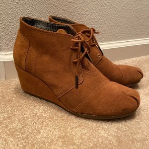 Toms low wedge booties.  Only worn once.